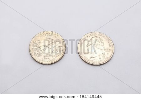 Closeup To Oklahoma State Symbol On Quarter Dollar Coin On White Background