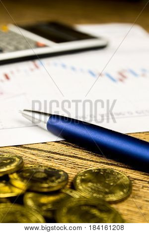 calculatorpencil and money on graffica the Dow Jones on forex market