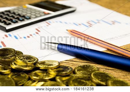 calculatorpencil and money on graffica the Dow Jones on forex market