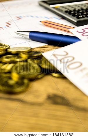 calculatorpencil and money on graffica the Dow Jones on forex market