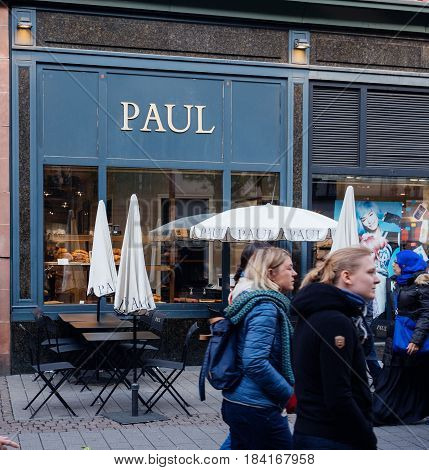 STRASBOURG FRANCE - APR 27 2017: Paul Boulangerie Et Patisserie cafe with open air terrace on French street. Paul is a French chain of bakery/cafe restaurants established in 1889 in the city of Croix in Northern France
