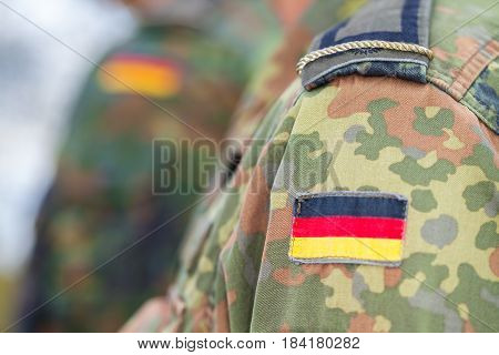 a german flag on german army uniform