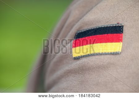 a german flag on german army uniform