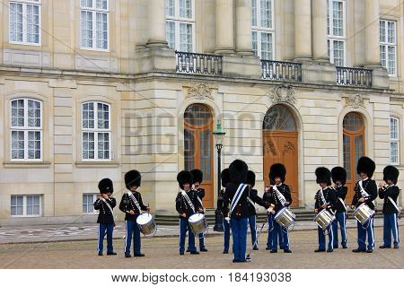 COPENHAGEN, DENMARK - APRIL 22, 2017 : Royal guardsmen in square of Royal castle Amalienborg, Copenhagen, Denmark.