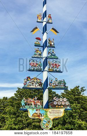 Munich, Germany - May 1, 2017: Bavarian Maypole on Viktualienmarkt a famous delicatessen market