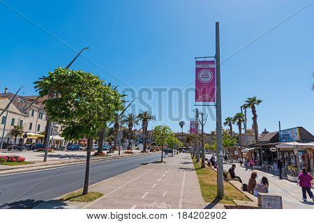 Alghero Italy - April 29 2017: Giro d'Italia banners in a bike lane