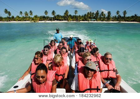 Saona Island, Dominican Republic - 1 February 2002: tourists on a boat on the way to the beach of Saona Island, Dominican Republic