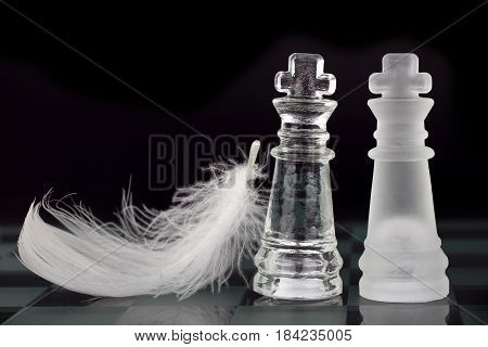 Glass chess team leaders kings and white leather on black