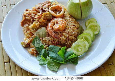 spicy fried rice prawn and pork with eggplant in shrimp paste sauce on plate