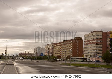 New Urengoy, YaNAO, North of Russia. September 1, 2013. Modern business offices on the 26th Congress of the CPSU street