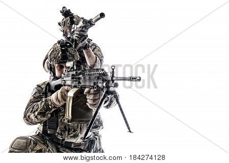 Two Army Rangers in field Uniforms with weapon. Studio shot