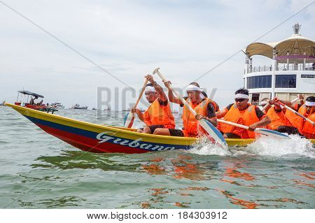 Labuan,Malaysia-April 29,2017:Group of boatman with life jacket participate in a boat tug of war games in Labuan International Sea Sports Complex at Labuan,Malaysia on 29th April 2017.