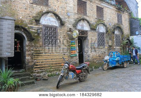 YANGSHOU CHINA - NOVEMBER 19, 2016: Unidentified people visit Xingping historical village. Xingping is a historical fishing village near Li river.