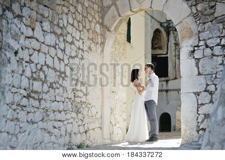 Happy caucasian couple in a sunny day in Sperlonga Italy