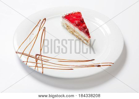 Dessert - Cheesecake With Berries Sauce On White Plate