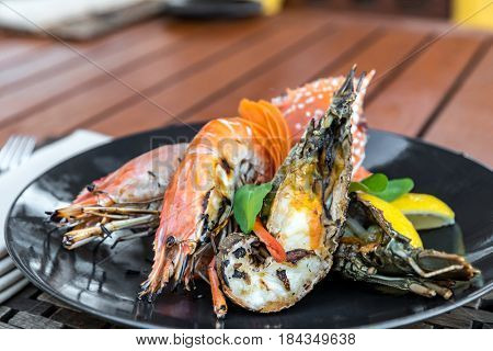 seafood platter delicious grilled prawn; rock lobster and red crab