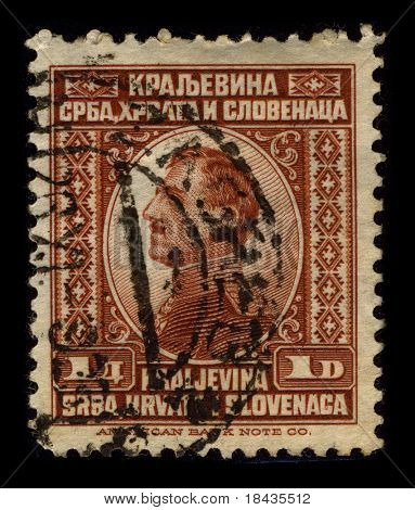 YUOGOSLAVIA-เซอร์กา 1920:A แสตมป์ที่พิมพ์ใน YUOGOSLAVIA แสดงภาพของอเล็กซานเดอร์ได้กษัตริย์องค์แรก