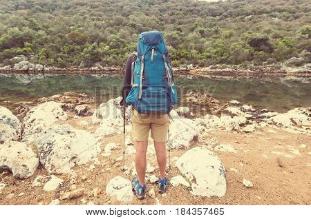 Hiking in famous Lycian Way in the Turkey. Backpacker in the trail.