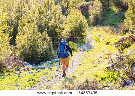 Hiking in famous Lycian Way in the Turkey. Backpacker in the trail.