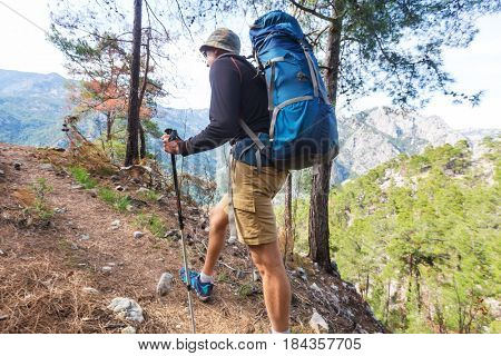 Hiking in famous Lycian Way in the Turkey. Backpacker in the trail.