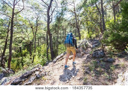 Hiking in famous Lycian Way in the Turkey. Backpacker in the trail.