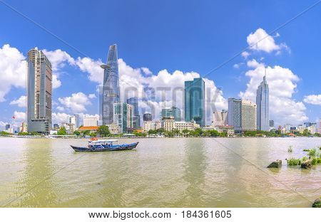 Ho Chi Minh City, Vietnam - May 1st, 2017:  Skyscrapers along river with architecture office towers, hotels, center cultural and commercial development country most in Ho Chi Minh city, Vietnam