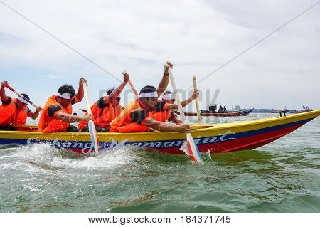 Labuan,Malaysia-April 29,2017:Group of boatman with life jacket participate in a boat tug of war games in Labuan International Sea Sports Complex at Labuan,Malaysia on 29th April 2017.