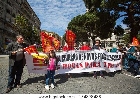PORTO, PORTUGAL - MAY 1, 2017: During celebration of May Day in the city centre. General Confederation of Portuguese workers, traditionally associated with the Communist party, has 800.000 members.