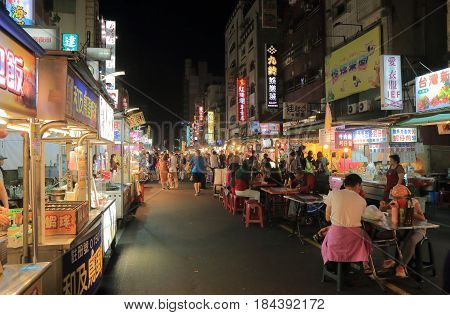 KAOHSIUNG TAIWAN - DECEMBER 13, 2016: Unidentified people visit Liuhe night street market. Liuhe market is one of the most popular markets in Taiwan.