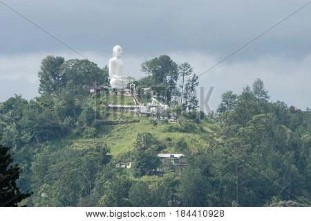Kandy, Sri Lanka - 18 January 2004: Big Buddha on top of the hill at Kandy on Sri Lanka