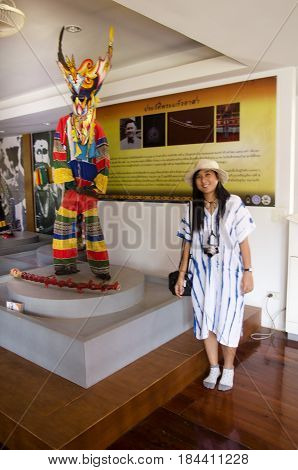 Asian Thai Woman Travelers Wearing Mask Head With Costume Of Phi Ta Khon Dance And Playing At Phi Ta