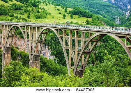 Mountain landscape, Montenegro. Durdevica Tara arc bridge in the mountains One of the highest automobile bridges in Europe.