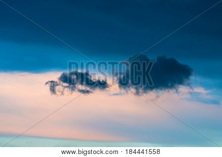 Lonely Gray Clouds In The Dark Evening Sky.