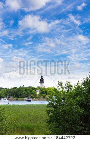 NAANTALI, FINLAND - JULY 4: Church, sky and port in Naantali, Finland on July 4, 2016