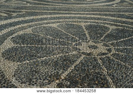 Detail, pebbled mosaic path of The Golden Road, Harem of Topkapi Palace, in Istanbul, Turkey