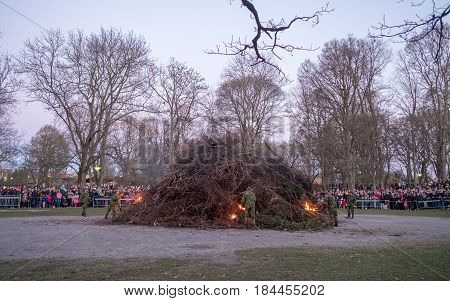 NORRKOPING, SWEDEN - APRIL 30, 2017: Traditional Swedish celebration of spring at Walpurgis night with bonfire and music at Folkparken in Norrkoping. The festival is named after Saint Walpurga.