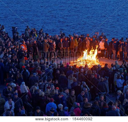 STOCKHOLM SWEDEN - APR 30 2017: Celebrating the spring with the Valborg bonfire at Riddarholmen in the evening April 30 2017 in Stockholm Sweden