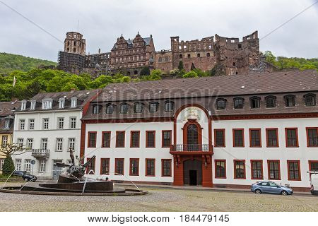 Karlsplatz square in Heidelberg old town Germany. Heidelberg castle on the background