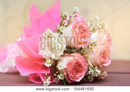 Flower bouquet colorful on wood desk background