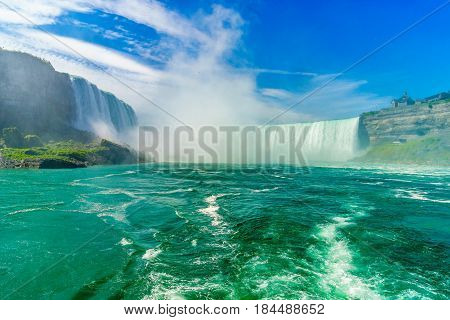 Water rushing over Niagara Falls New York USA