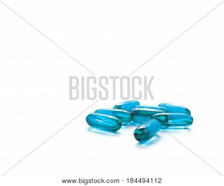 Medicine concept. Pill isolated on white background. A bunch of blue pills isolated on white.