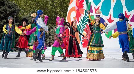 Shymkent, KAZAKHSTAN - May 1, 2017: People in national costumes on the Day of Unity of the People of Kazakhstan.