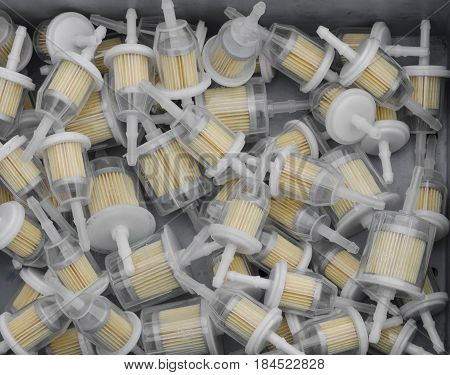 A pile of plastic in-line petrol filters