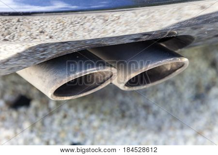 Closeup of a car exhaust. Double pipe from a diesel engine