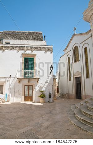 Characteristic alleyway of Locorotondo. Puglia. Southern Italy.