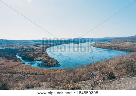 a moutain landscape with a river lake in forest in Inner Mongolia Hulunbeier