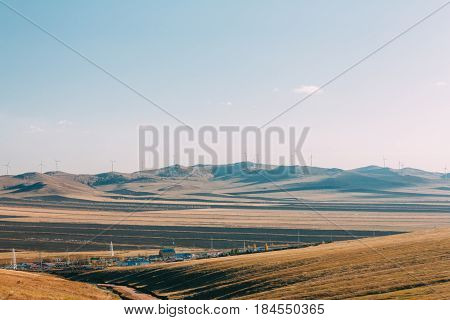 Windmill In Grassland, Prairie In Inner Mongolia, China