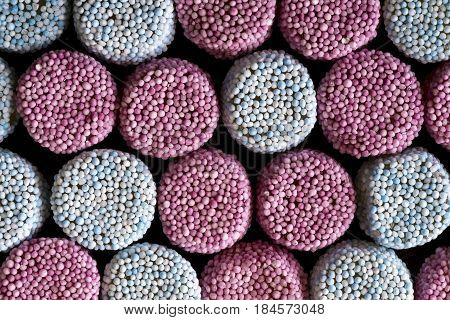 Gummy Candy Sprinkle Coated on Dark Stone Background
