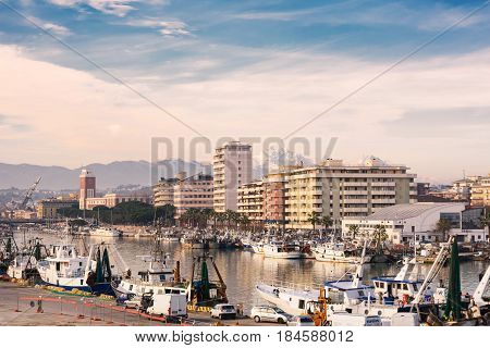 Pescara, Italy - December, 9, 2016: Channel port in Pescara river and the city in background (Abruzzo)