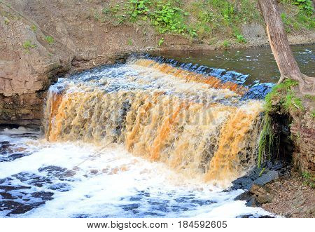 Small waterfall on Sablinka River in Leningrad Region Russia.